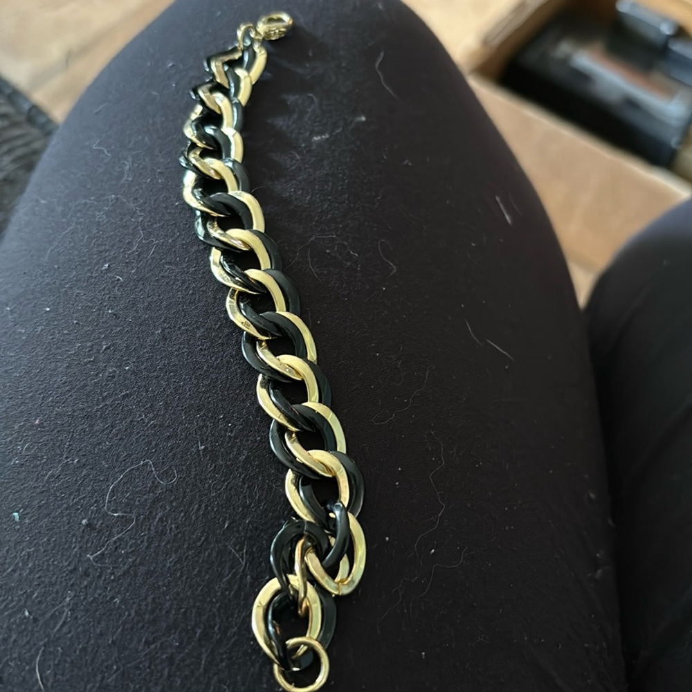 Gold tone and black bracelet